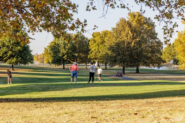 Friends gather to play golf at Shifferdecker Golf Course.