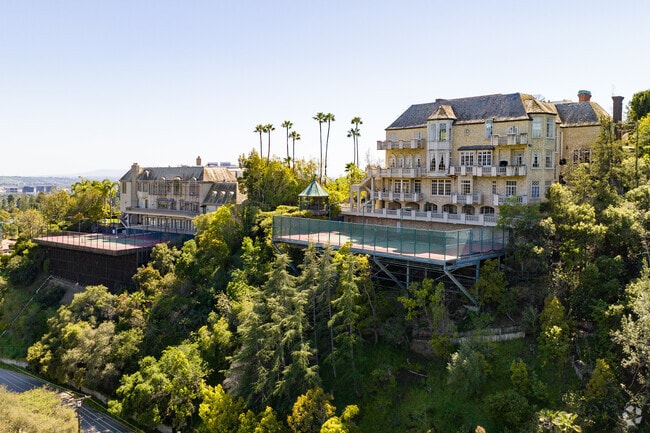 alt castle homes on a hill with  tennis courts