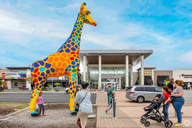 Standing tall and proud, the majestic giraffe statue at Springfield Town Center.