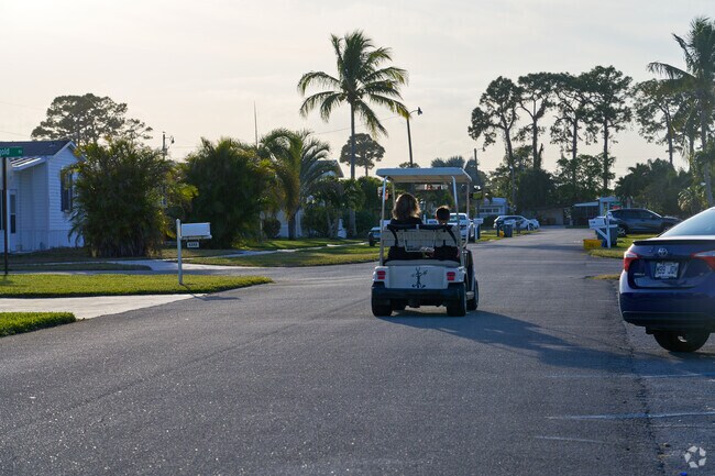 Tropical Breeze residents can be seen navigating around on their golf carts.