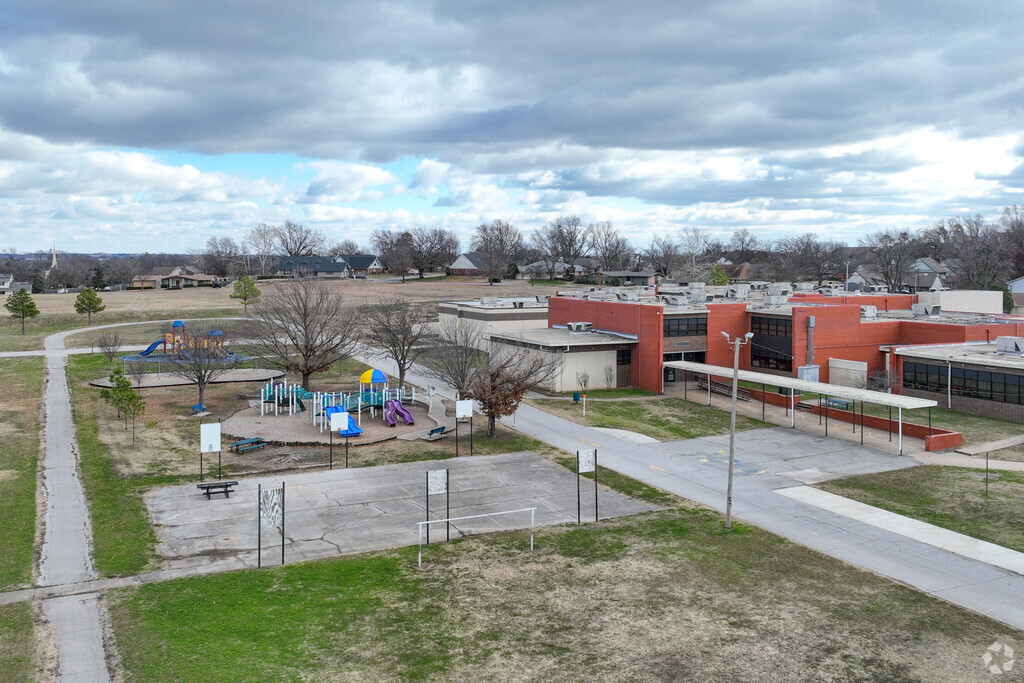 Salk Elementary School playground provides lots of options to run and play.