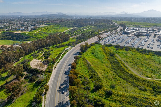 Oak Park Context of the main road leading into the tretail shopping center.