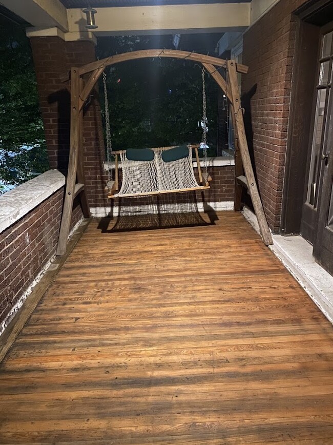 lovely private relaxing porch, with swing.