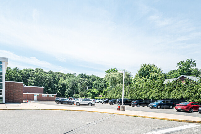 Sunquam Elementary School large parking lot sits to the right of campus in Melville.