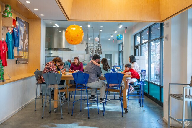 Sit inside Toscanini's in East Cambridge and enjoy your ice cream with your family.