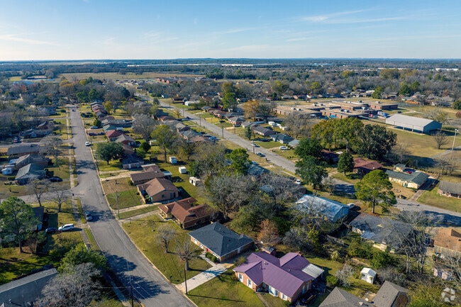 Mature trees in West Montgomery homes' backyards offer privacy from neighbors.