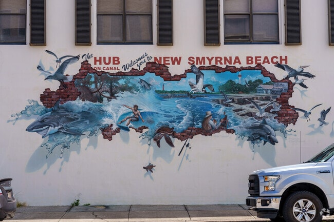 Canal Street, minutes from Central Mainland, features murals and fantastic restaurants.