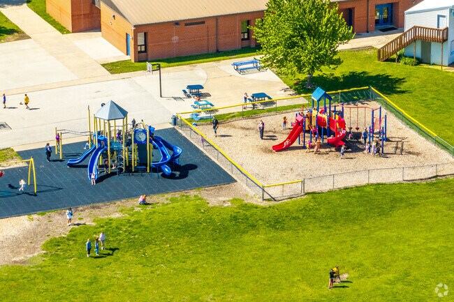 Playground equipment for all ages of students make for fun recess time.