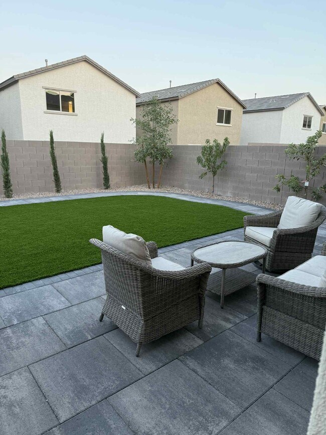 Freshly landscaped backyard with cool to touch turf