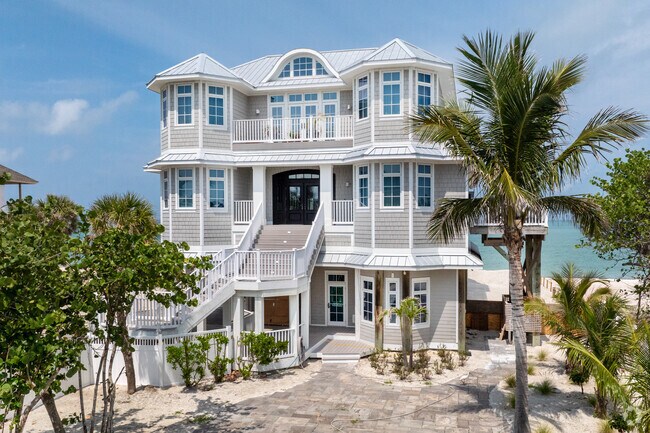 Grand modern homes tower over the beaches giving prime waterfront views on North Captiva Island.