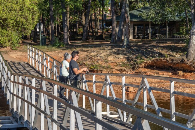 You can go fishing in Lake Lanier on the dock at Longwood Park.