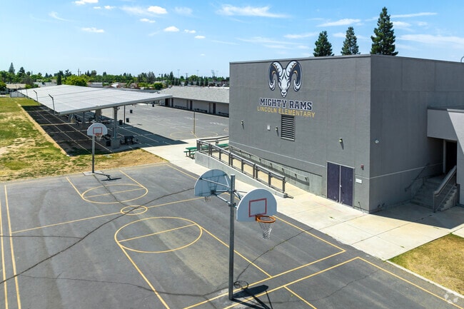 Students play basketball at Lincoln Elementary School in Sanger.
