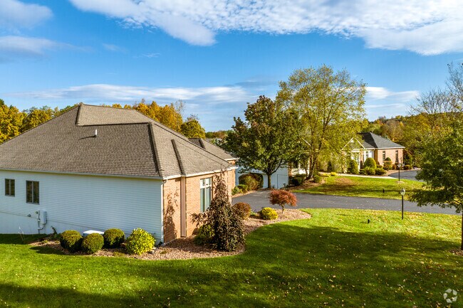 Jamesville features brick ranches set amongst glades of mature maples and oaks.