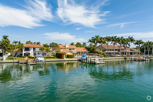 Three different style homes share the same view in the Bayway Isles community.