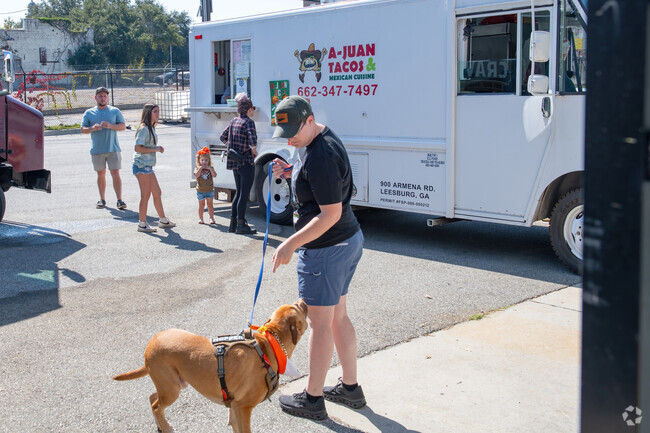 A pet and a food truck at teh Halloween Market at Pretoria draws locals from Cleveland Heights.