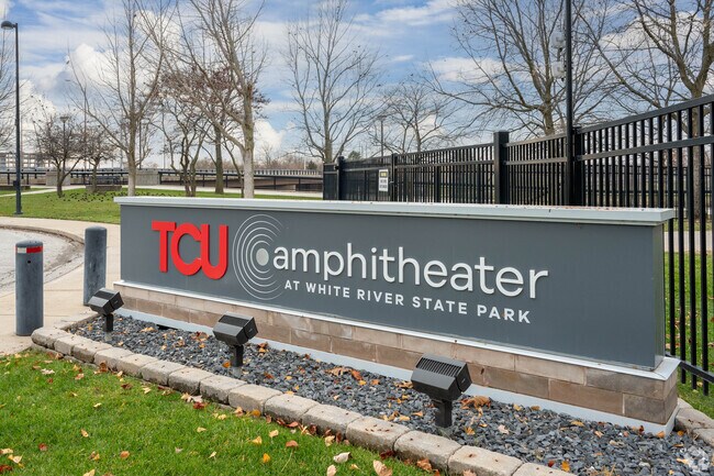 The entrance to TCU Amphitheater at White River State Park welcomes visitors with a clean, modern sign—your first hint that good music and good times are just ahead.