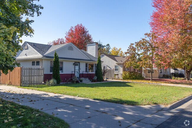 Locals like to stroll past cozy cottages and vibrant autumn foliage in Sherwood Glen.