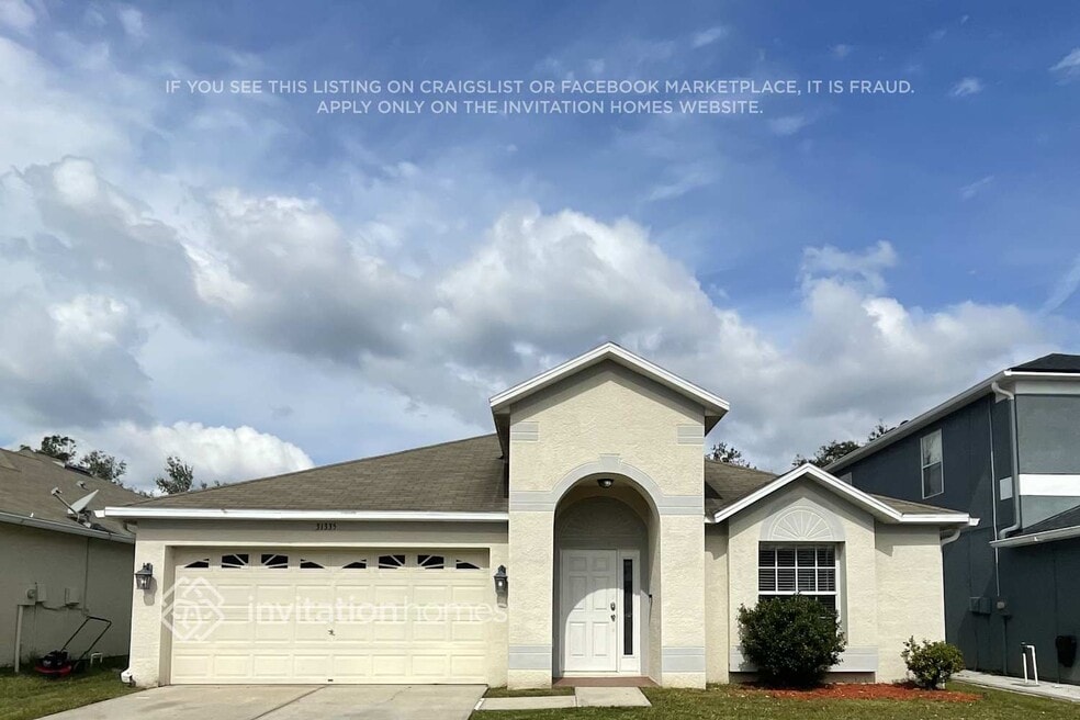 31335 Glendalough Way, Wesley Chapel, FL 33545 - photo 1