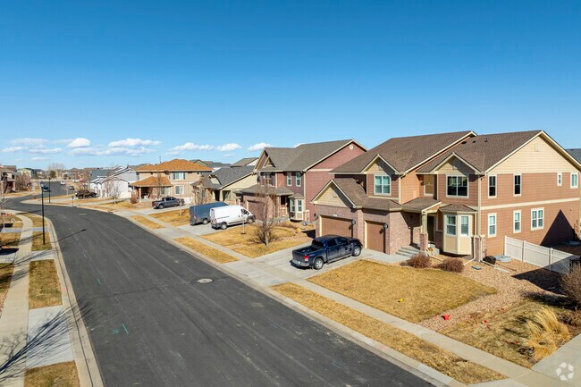 In Firestone, CO, charming 1970s ranch-style homes offer spacious layouts and a connection to the surrounding farmland. These residences often feature large yards, perfect for families seeking comfort and outdoor space in a serene environment.