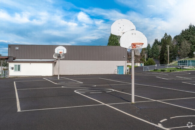 Charlemagne French Immersion Elementary School has basketball hoops for kids to play on.