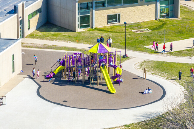 Modern playground equipment make for fun recess time.