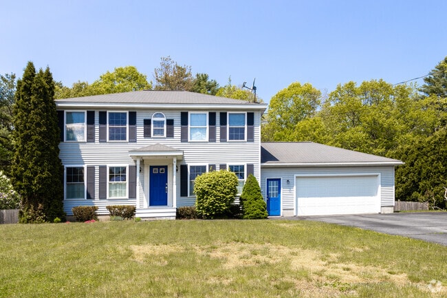 A modern colonial with an attached garage in Brunswick.