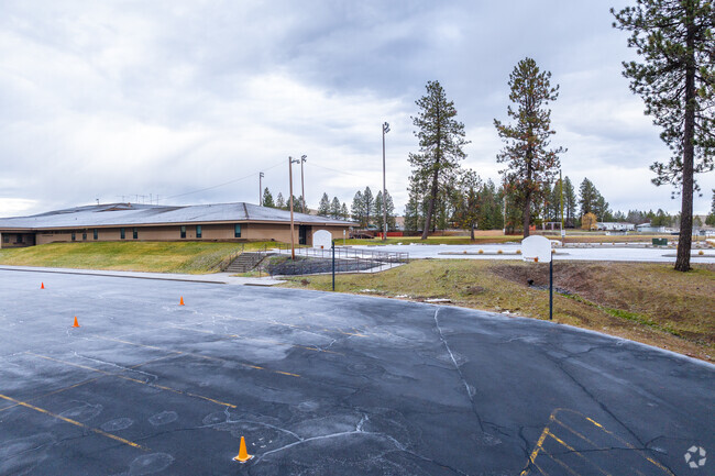 Liberty Elementary and junior high feature a couple basketball hoops behind the building.