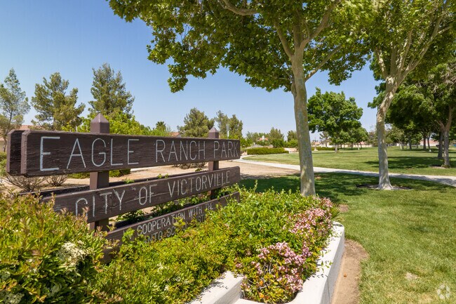 Wide trails and shaded trees welcome visitors to Eagle Ranch Park in Mesa Linda.