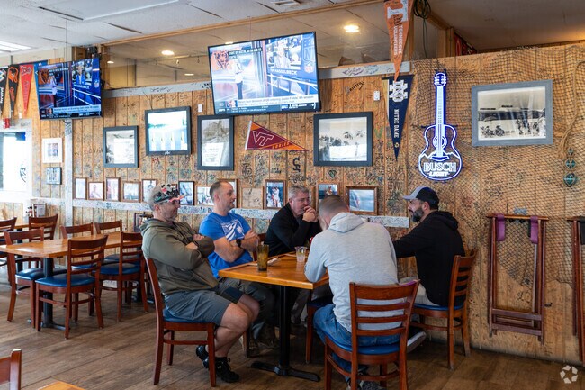 Locals and residents relax at Flora-Bama's Ole River Grill.