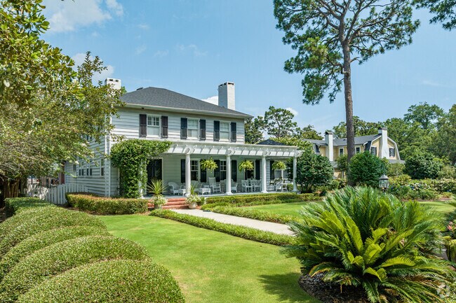 Homes in Forest Hills South impress with lush gardens and covered porches.