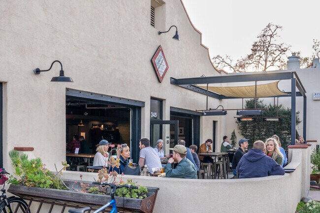 Enjoy a drink from Topa Topa Brewing and the views of Topa Topa Mountains in Ojai.