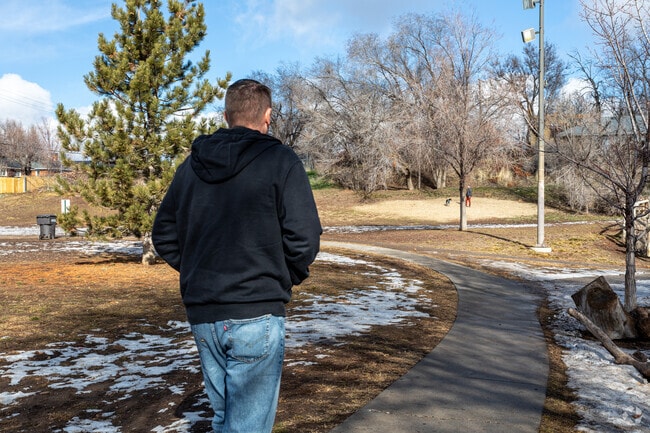 Enjoy a walk at Wasatch Hollow Park located in the Bonneville Hills neighborhood.