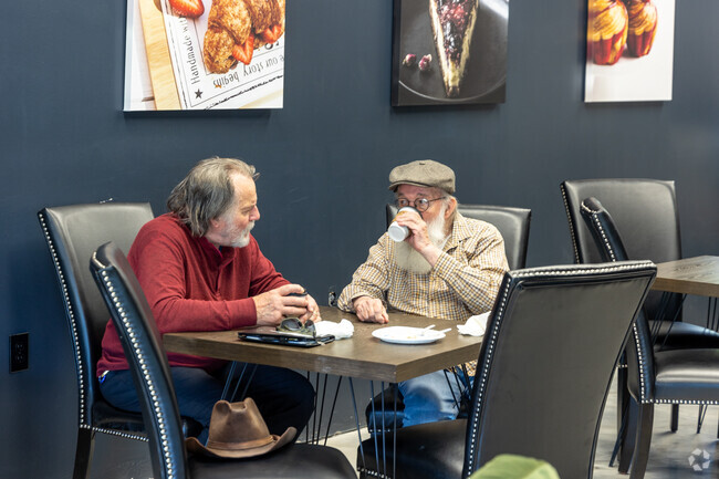 Enjoy a coffee with a friend at The Wicked Whisk Bakery near Hilldale Pines.