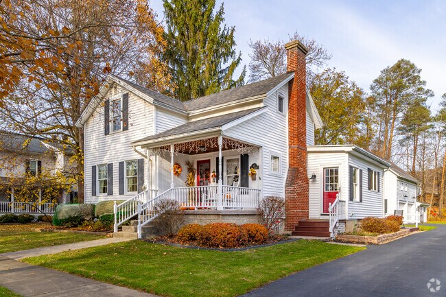 Larger single family homes in Holland might include front porches and brick chimneys.