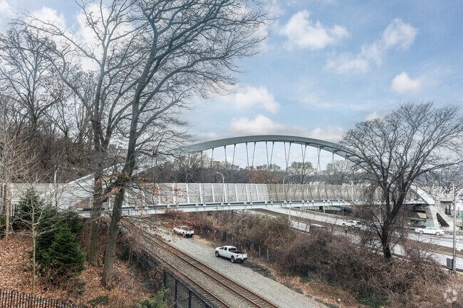 The Denny Farrell pedestrian bridge connects West 151st Street with the Hudson River Greenway.
