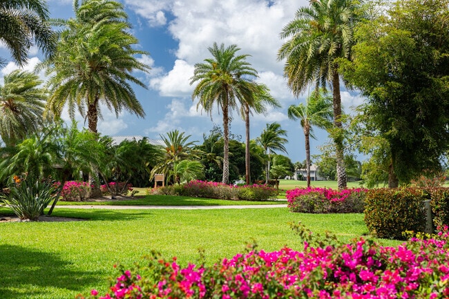 Imperial Golf Estates is beautifully appointed with colorful tropical landscaping.