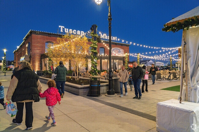 Families walk around the Holiday Shoppes at Tuscan Village and discover fun things to shop.