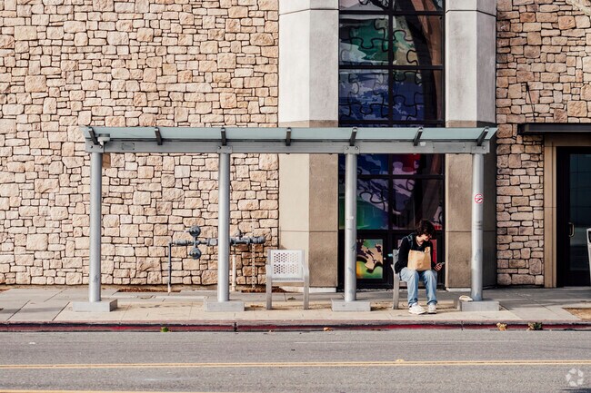 A local waiting for the bus in Downtown San Jose.