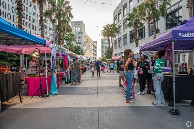 Residents of Meridan Parks support local businesses during Art After Dark at Lake Nona Town Center.
