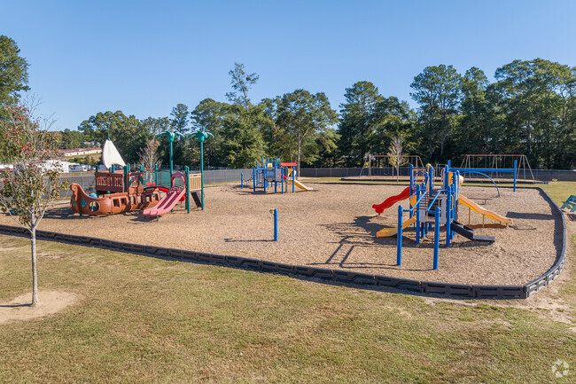 Several new and unique play structures are at Holsenbeck Elementary School.