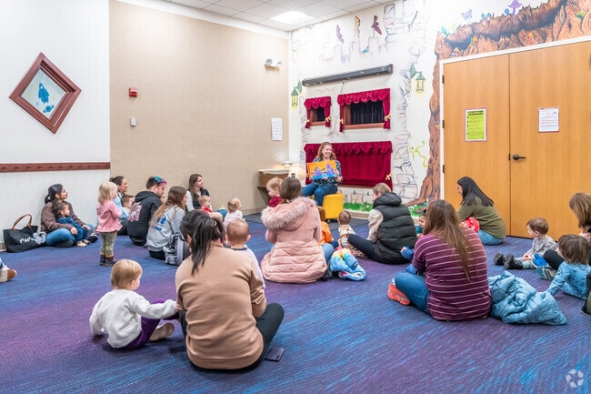 Families with young children go to Small Fry Story Time at the Sun Prairie Public Library.