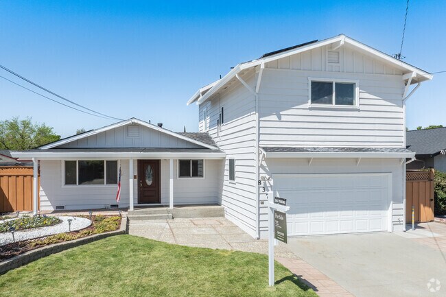 This two-story home in Jensen offers classic charm with plenty of space for comfortable living.