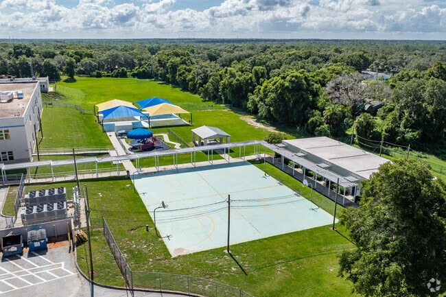 Students enjoy outdoor play on the sports courts at Cimino Elementary.