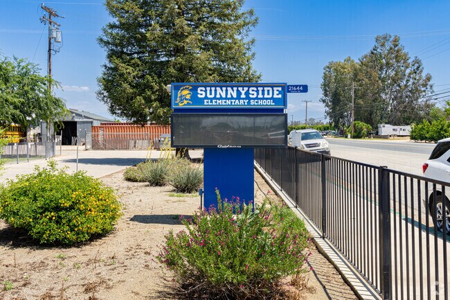 A lighted marquee at the entrance to Sunnyside Elementary School informs parents of events.