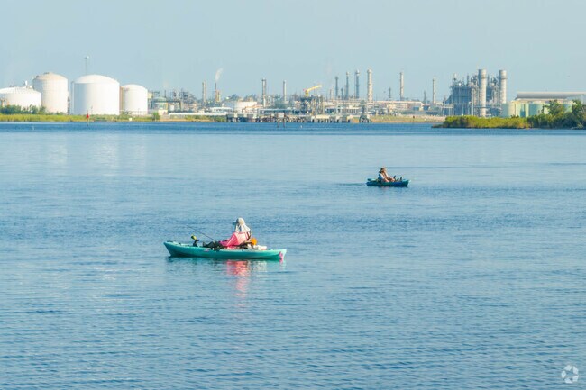 Kayakers enjoy a morning on Lake Charles, launching out of LeFleur Park in Prien.