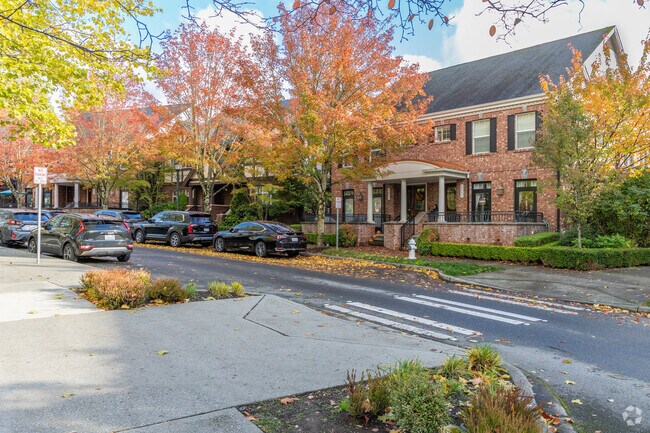 The homes that surround the Village Green park in Issaquah Highlands utilize brick facades.
