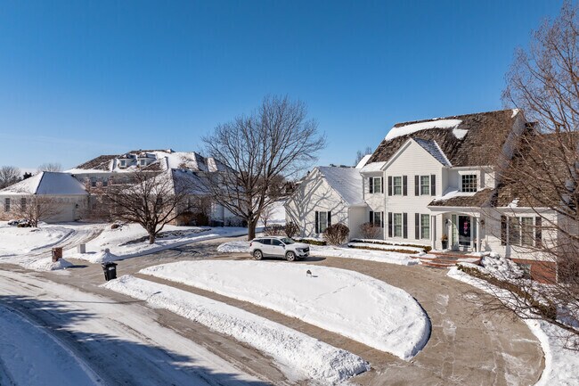 Many Champions Run homes have large yards and driveways.