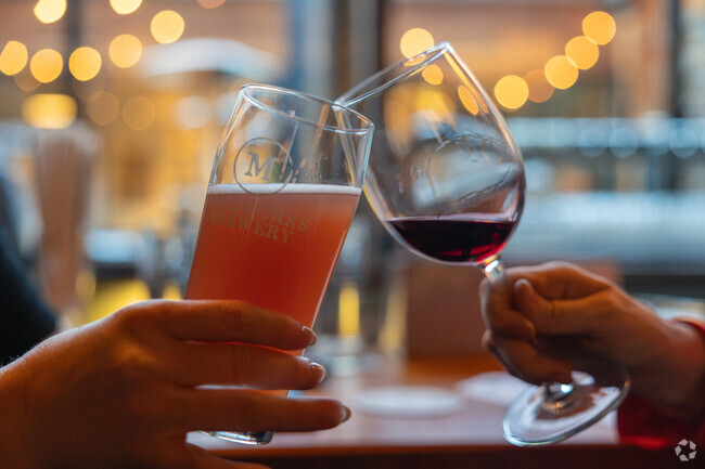 Enjoy a cold beer from tap or glass of wine with the nightlife in Westmont at Reunion Hall.