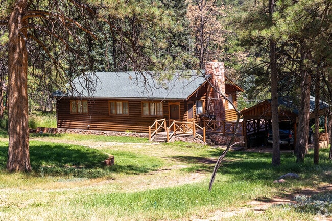 Log cabins are a popular choice in the scenic Green Mountain Falls neighborhood.