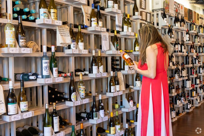 A customer browses for the perfect bottle at Wine & Whimseys in Tucker, near Pittsburg.